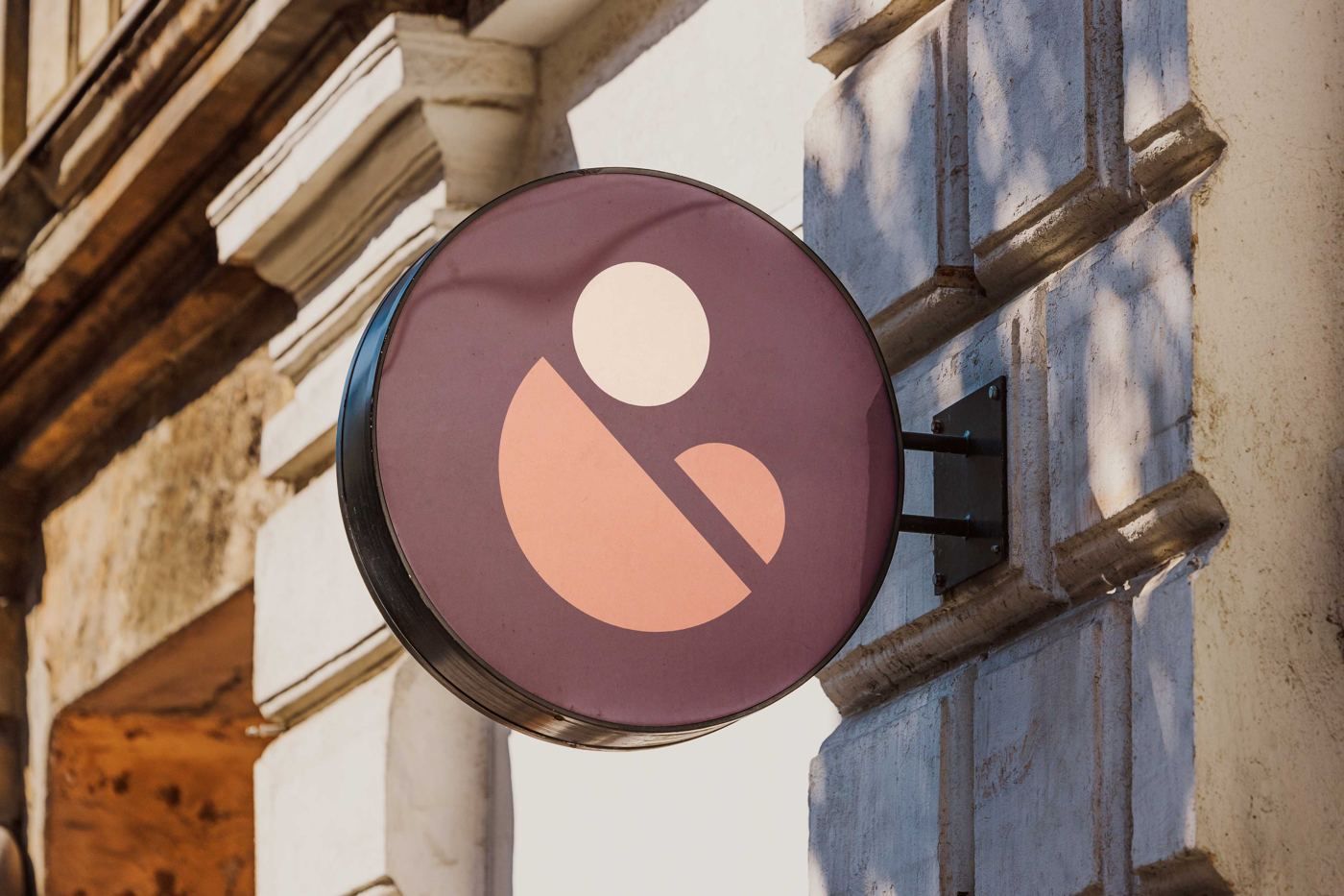 Physio Bump circular signage mark on Physio Purple